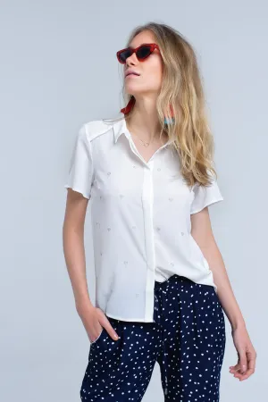 Cream shirt with heart embroidery
