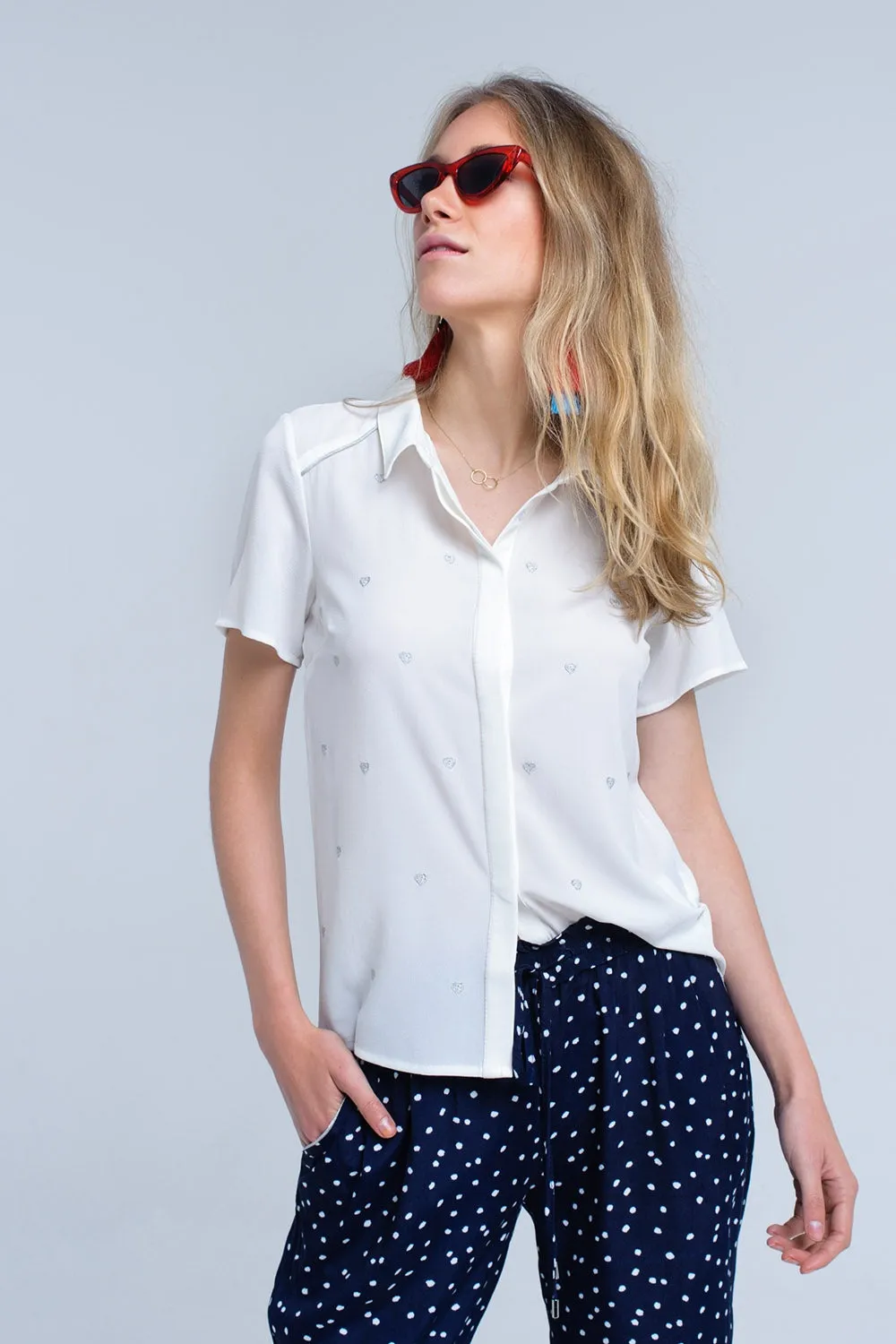Cream shirt with heart embroidery